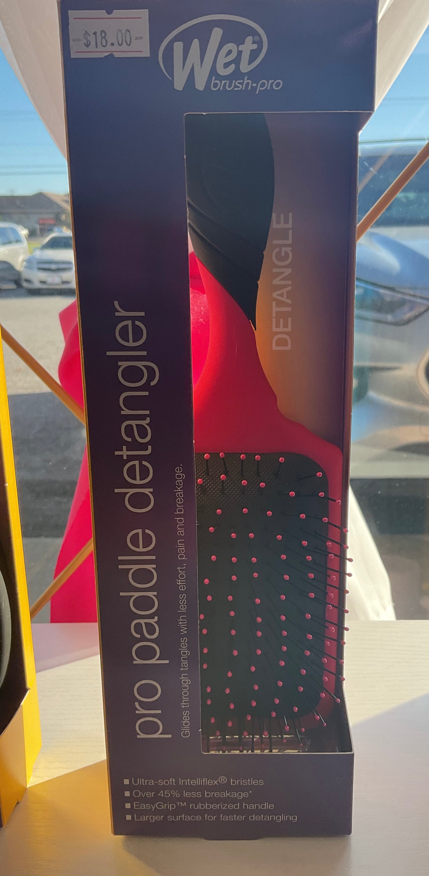 Wet brush paddle detangler